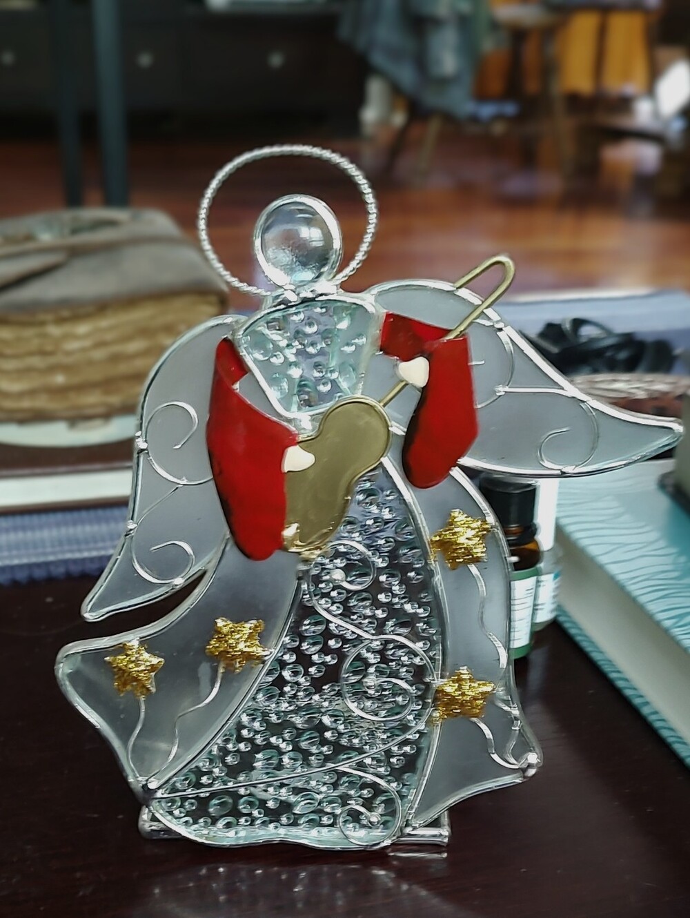 Stained Glass Angel with Red Accents and Gold Stars